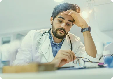 a doctor in tension waiting for the results