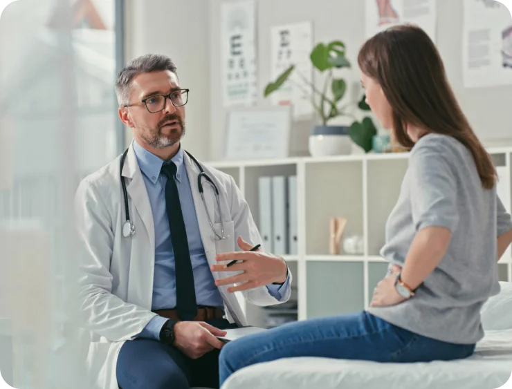 a gastro doctor explaining her patient about the problem with her stomach