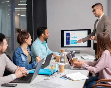 a man giving presentation if office