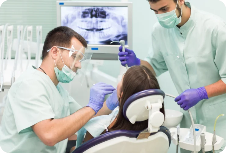 dentists operating on patient