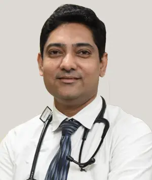 Dr. Akash Balki, a pulmonologist, posing professionally in a white coat
