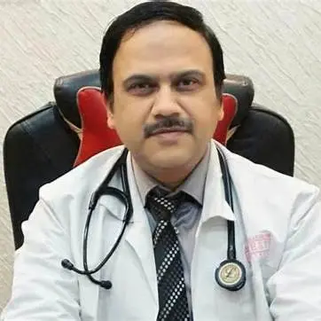 Dr. Rajesh Swarnakar, a pulmonologist, seated in a professional setting with a stethoscope