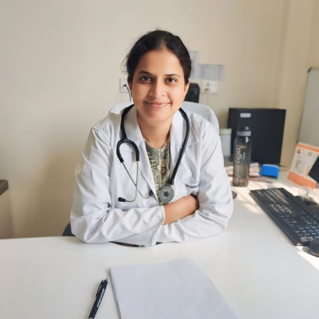 Doctor at Clinic Desk – Dr Ushashree at Consultation Table