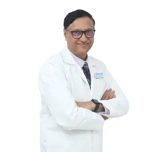 Senior Doctor in White Coat with Arms Crossed