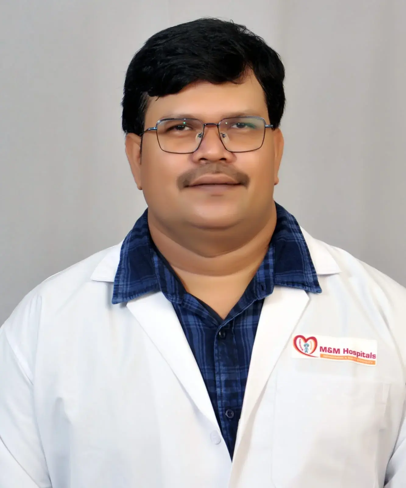 Doctor in white coat portrait
