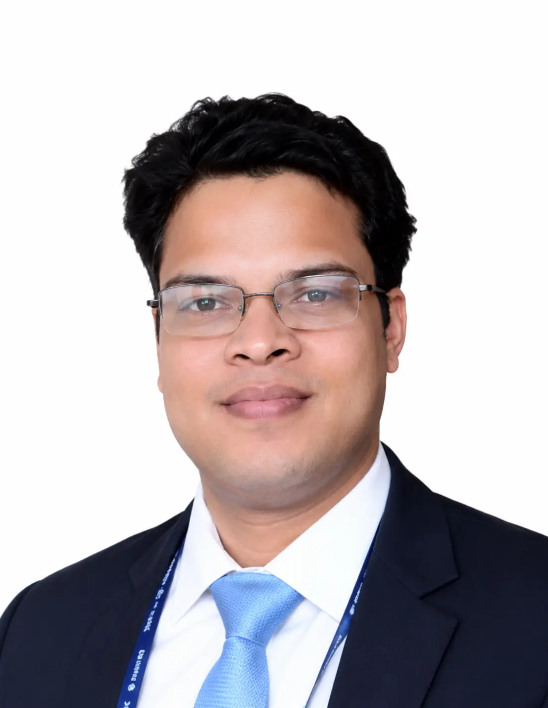 Dr. Ajay Kumar Pal, minimal access and hernia surgeon, in a dark suit, light blue tie and glasses