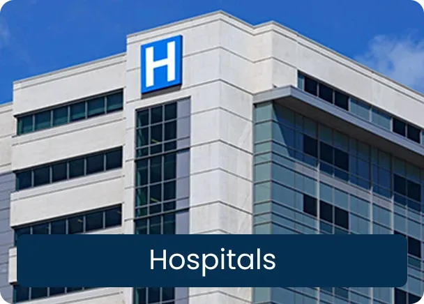 Hospitals: a large white and glass hospital building with a blue H sign against a blue sky